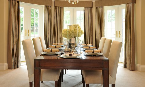 Dining room with draped windows