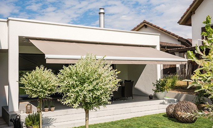 House with a retractable awning