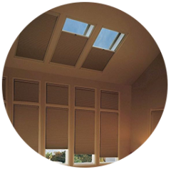 Skylight shades in a wood-panelled room